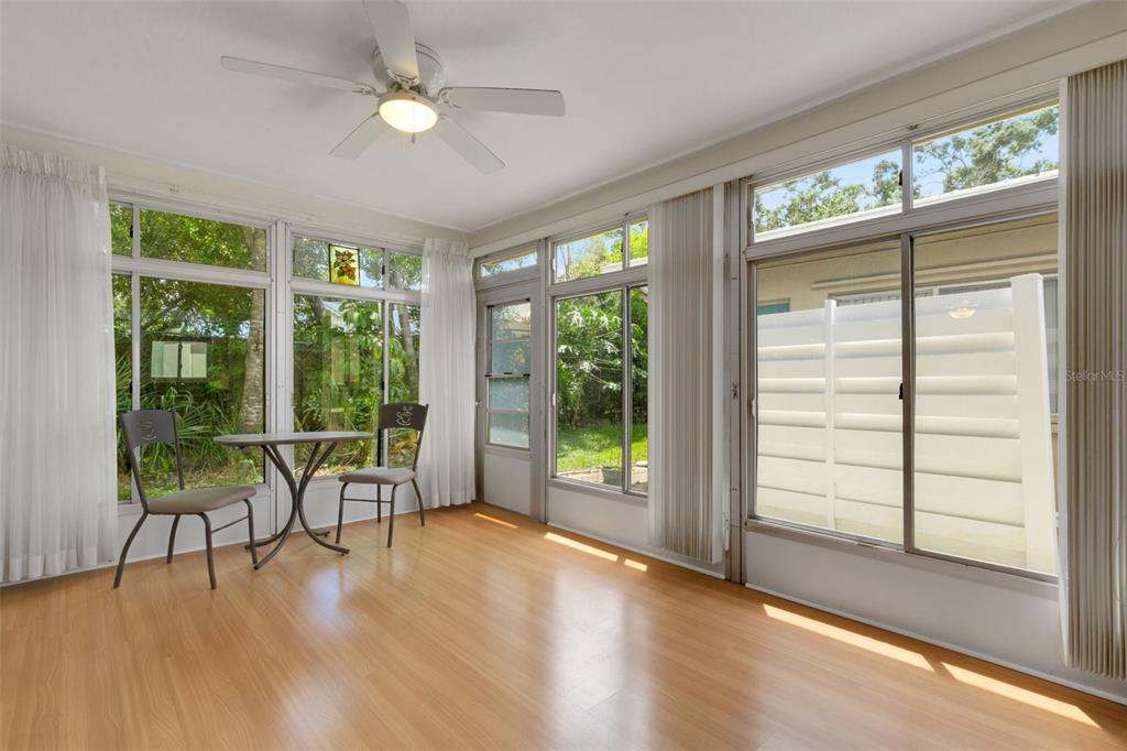 66 Strathmore Boulevard Sarasota, FL 34233 - Photo 6 of 39 a view of workspace with furniture and garden view