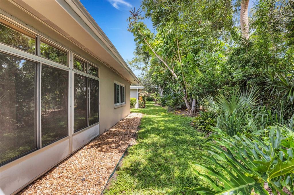 66 Strathmore Boulevard Sarasota, FL 34233 - Photo 7 of 39 a view of a house with backyard