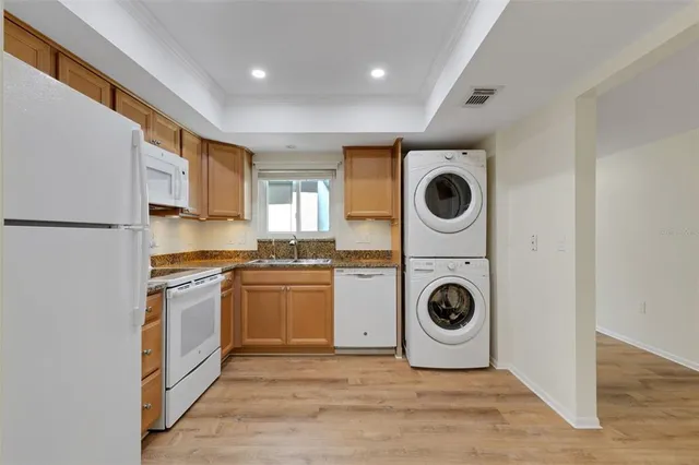 a view of kitchen with washer and dryer