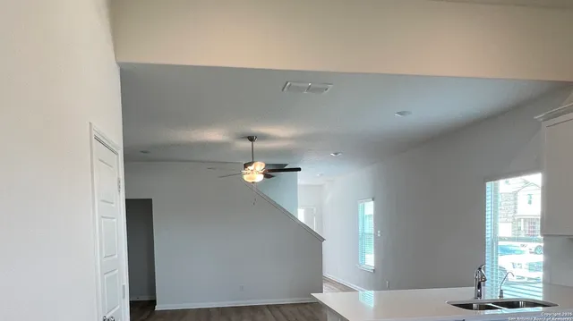 a view of entryway and hall with a window