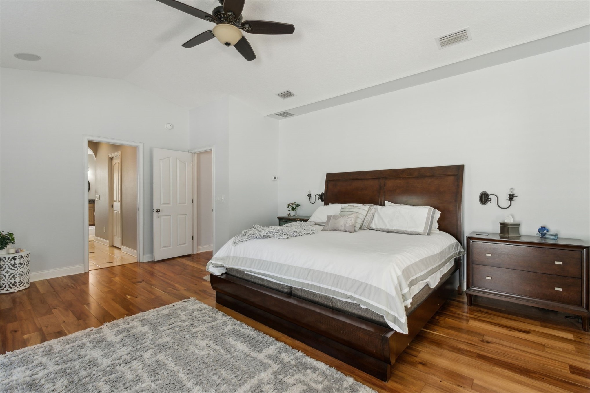 87377 Raddin Road Yulee, FL 32097 - Photo 39 of 75 a bedroom with a bed and dresser