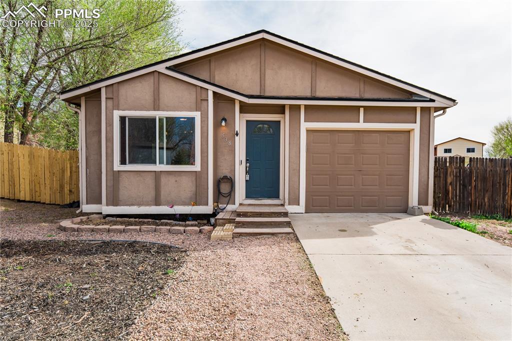 538 Blossom Field Road Fountain, CO 80817 - Photo 2 of 16 a front view of a house with a yard