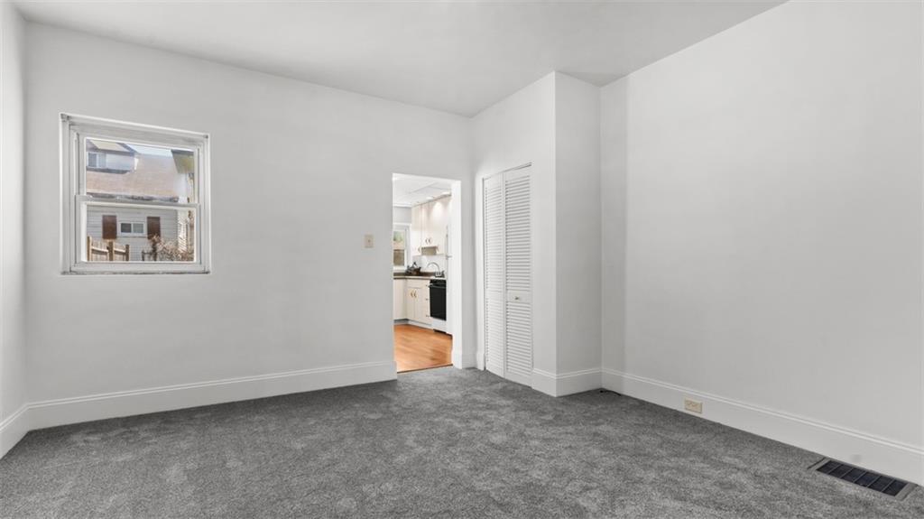 210 19th Street Pittsburgh, PA 15215 - Photo 11 of 33 an empty room with windows and closet