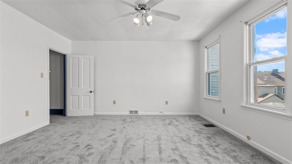 210 19th Street Pittsburgh, PA 15215 - Photo 20 of 33 a view of an empty room with a window