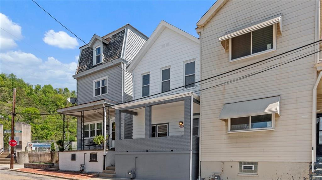 210 19th Street Pittsburgh, PA 15215 - Photo 32 of 33 a front view of a house with balcony