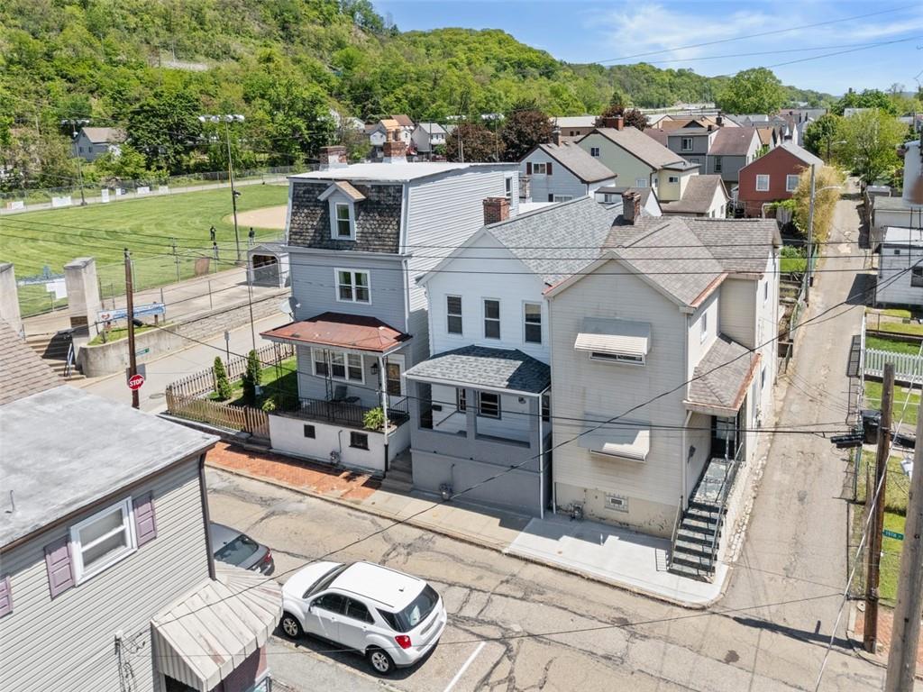 210 19th Street Pittsburgh, PA 15215 - Photo 33 of 33 an aerial view of a house with garden space and street view