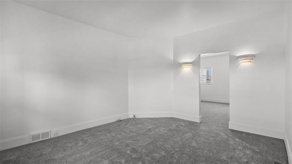 210 19th Street Pittsburgh, PA 15215 - Photo 8 of 33 a view of an empty room