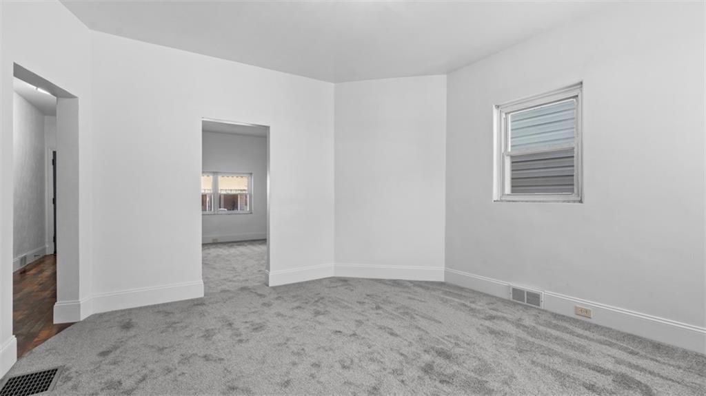 210 19th Street Pittsburgh, PA 15215 - Photo 10 of 33 an empty room with windows and closet