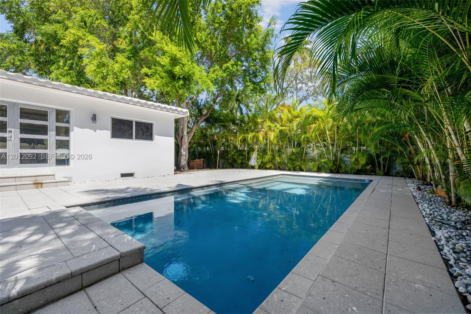 830 Northeast 72nd Street Miami, FL 33138 - Photo 16 of 19 a view of a backyard with plants