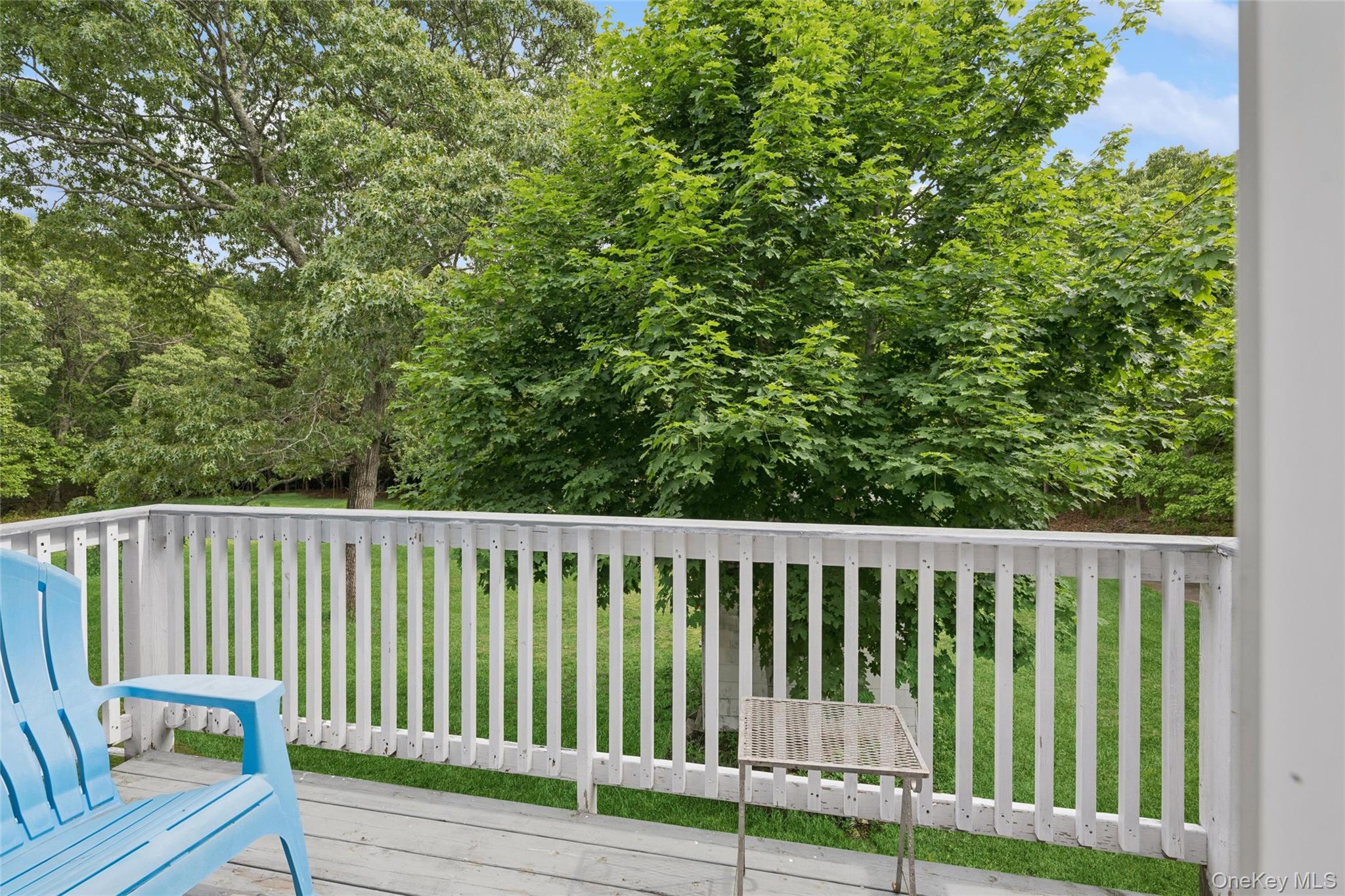 131 Red Creek Road Hampton Bays, NY 11946 - Photo 25 of 35 a view of a wooden fence
