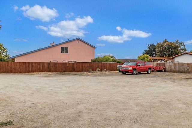 a car parked in front of a house