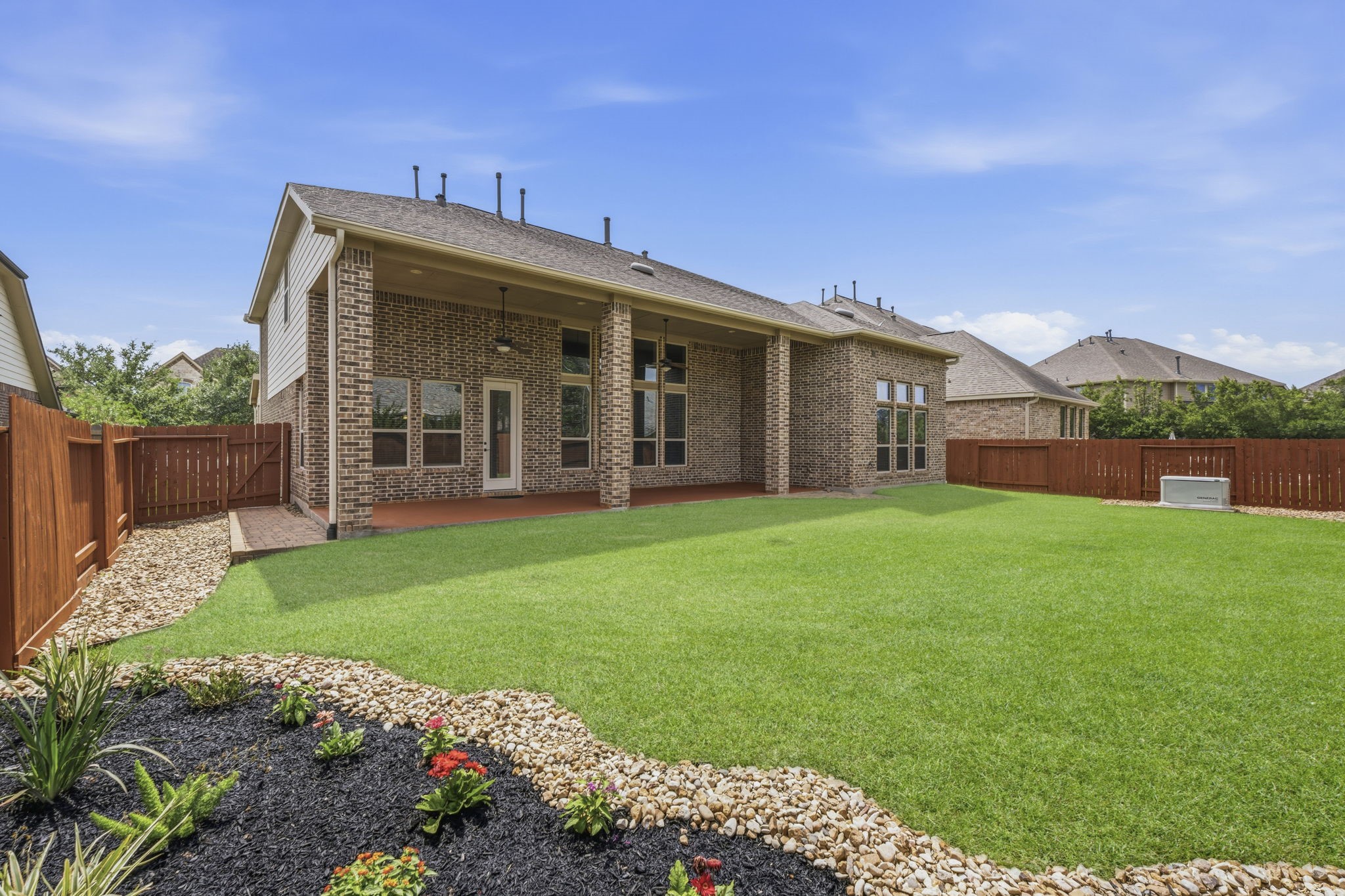 25210 Gaddis Oaks Drive Spring, TX 77389 - Photo 42 of 50 a view of a house with garden