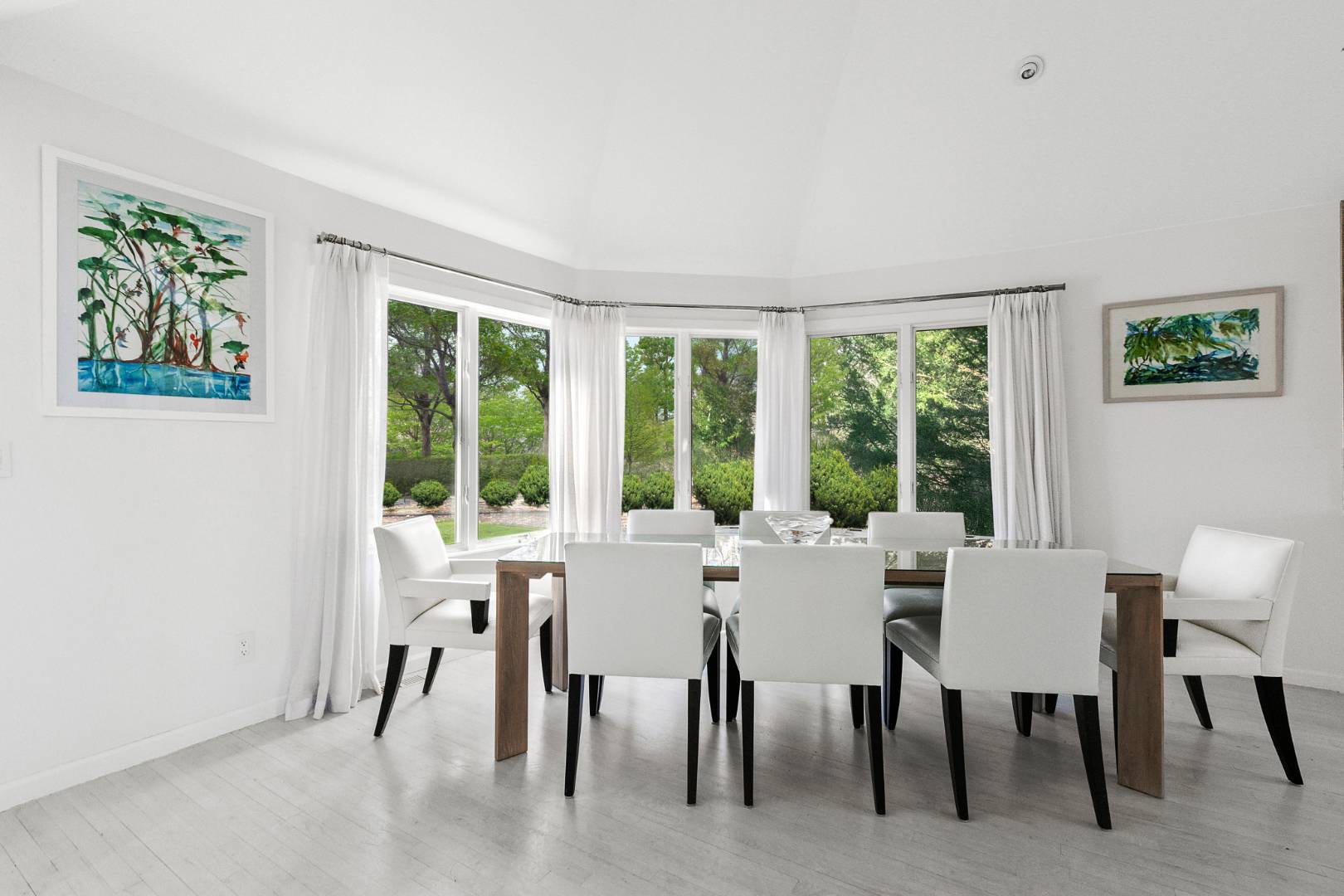47 Tansey Lane Bridgehampton, NY 11932 - Photo 11 of 28 a view of a dining room with furniture large windows and wooden floor