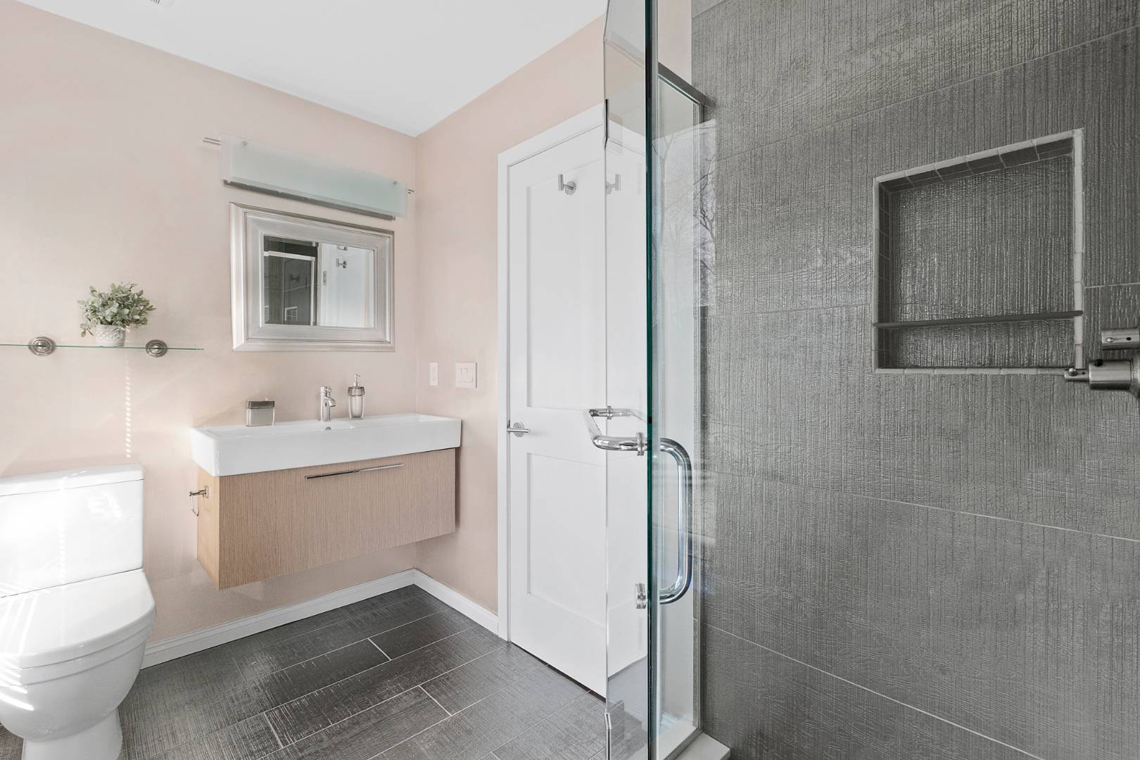 47 Tansey Lane Bridgehampton, NY 11932 - Photo 13 of 28 a bathroom with a sink a toilet and shower