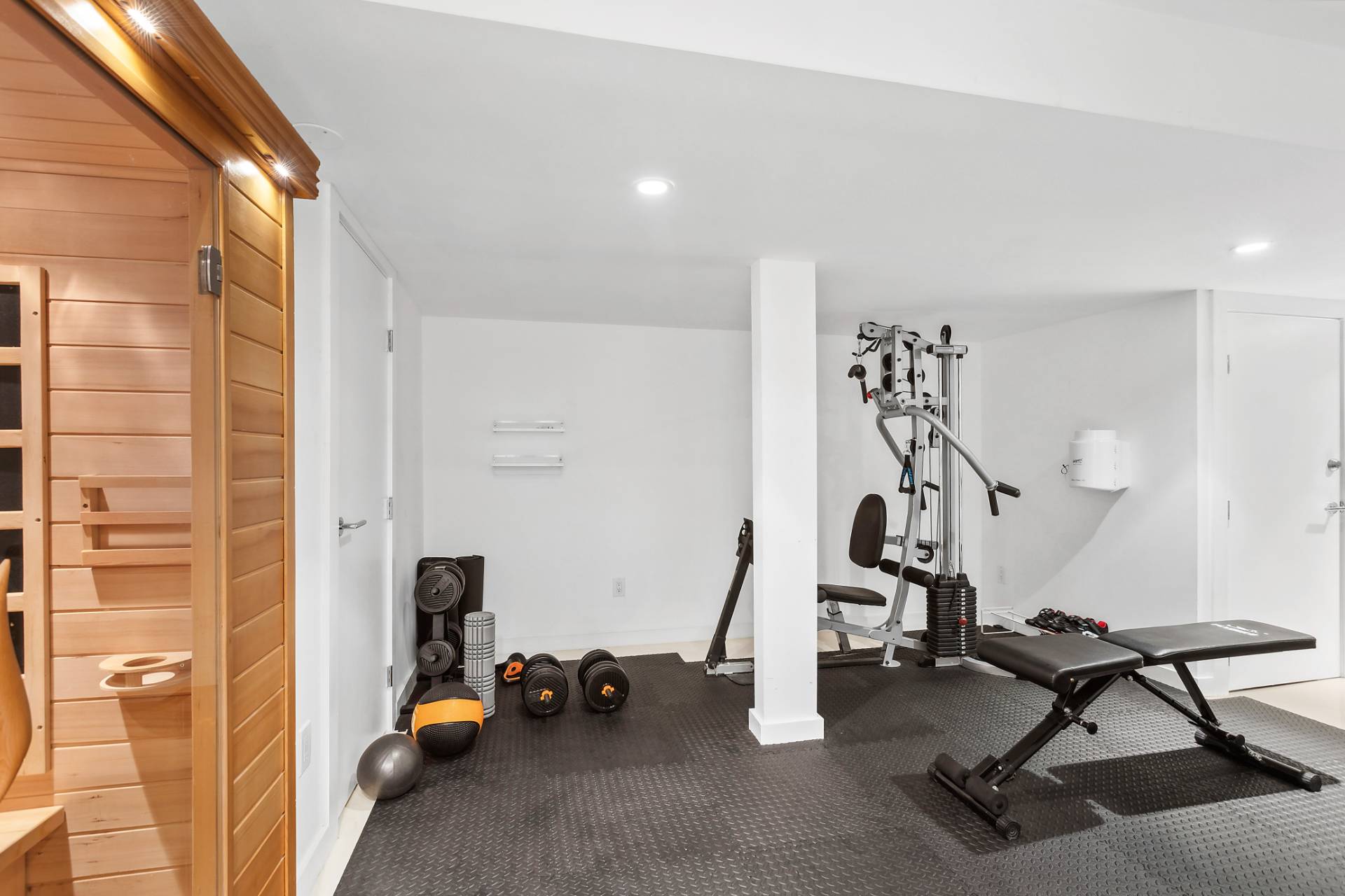 47 Tansey Lane Bridgehampton, NY 11932 - Photo 22 of 28 a view of a room with gym equipment