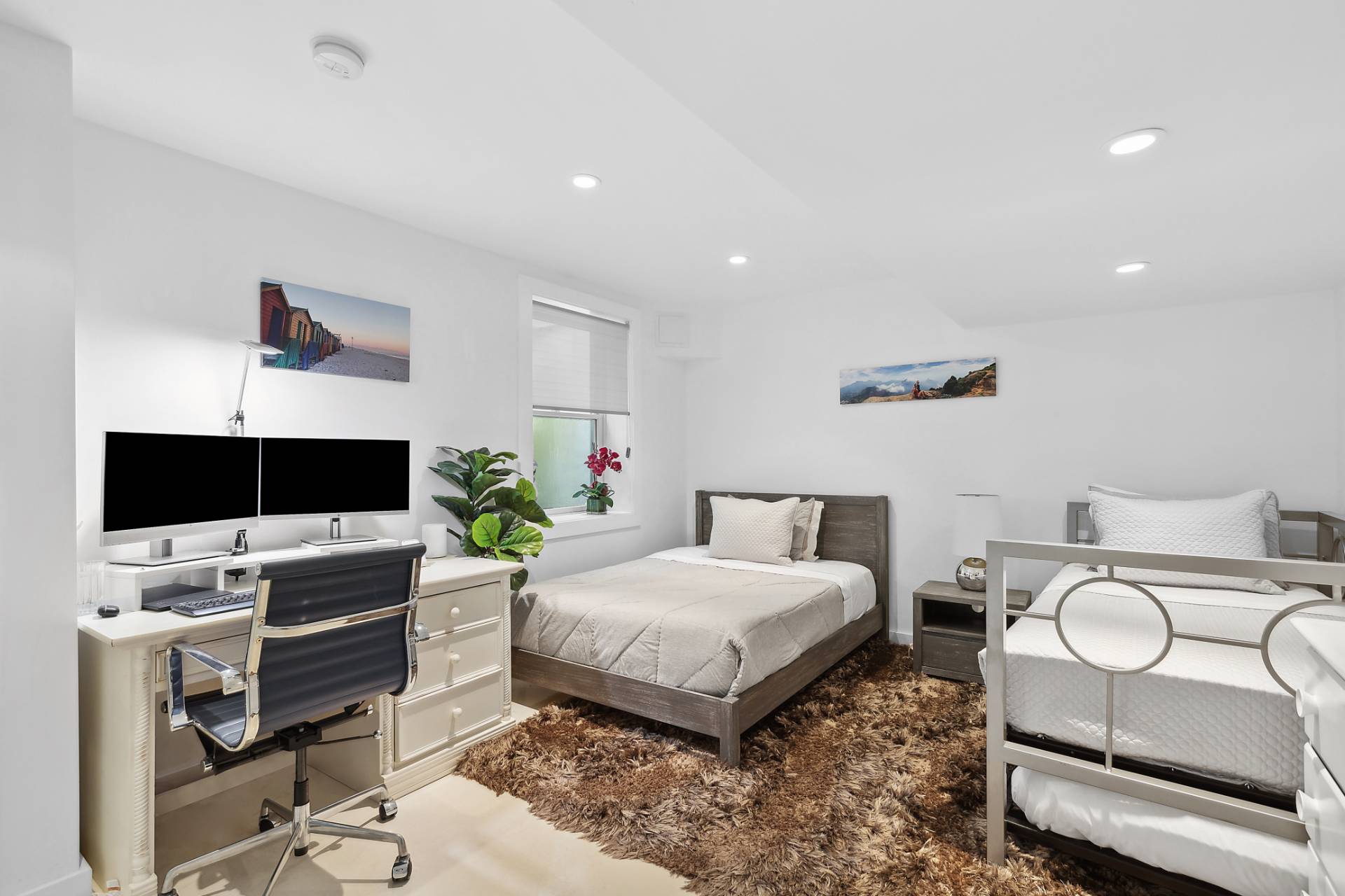 47 Tansey Lane Bridgehampton, NY 11932 - Photo 23 of 28 a bedroom with a bed and a flat screen tv