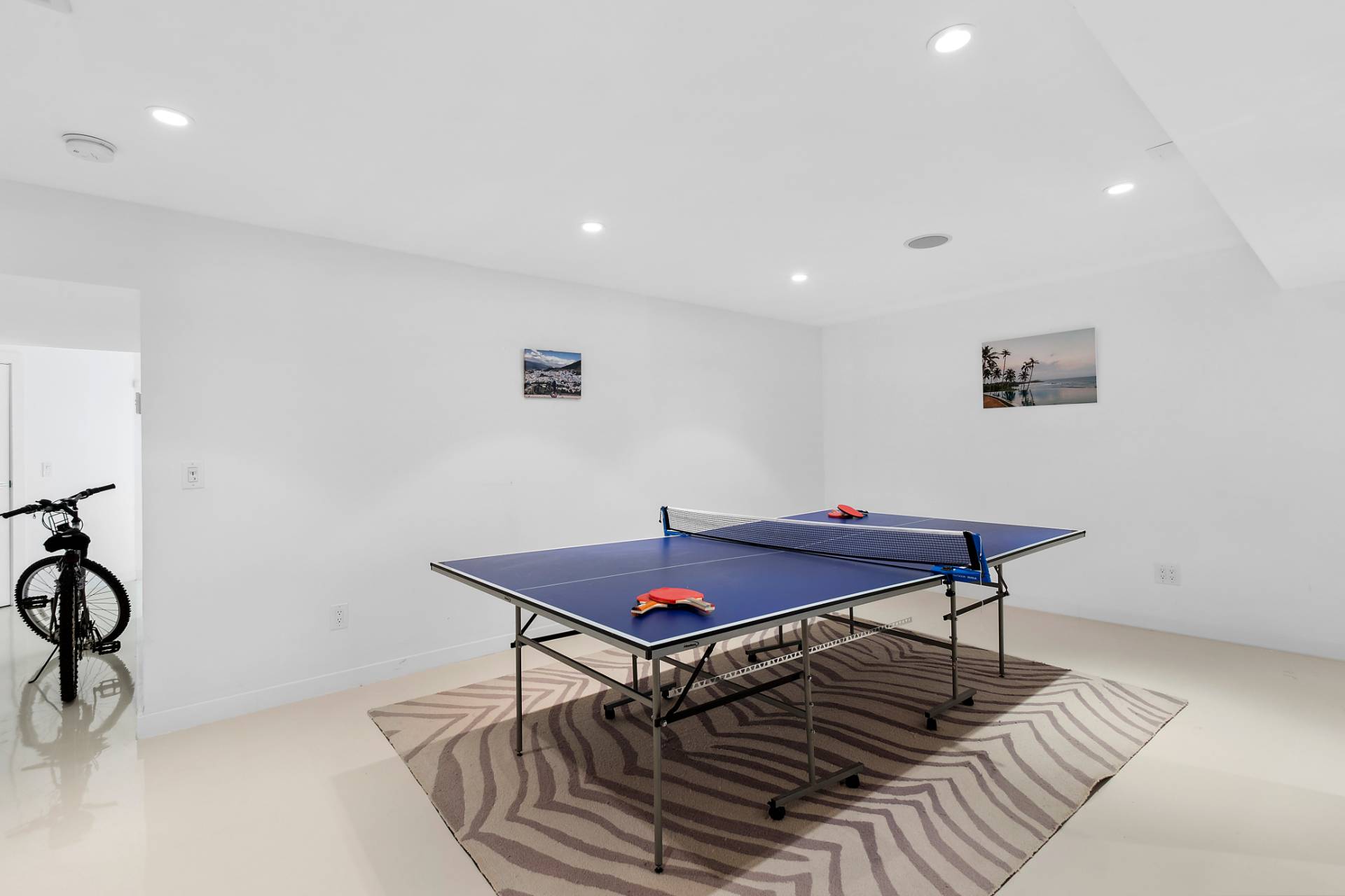 47 Tansey Lane Bridgehampton, NY 11932 - Photo 25 of 28 a living room with furniture a rug and a table