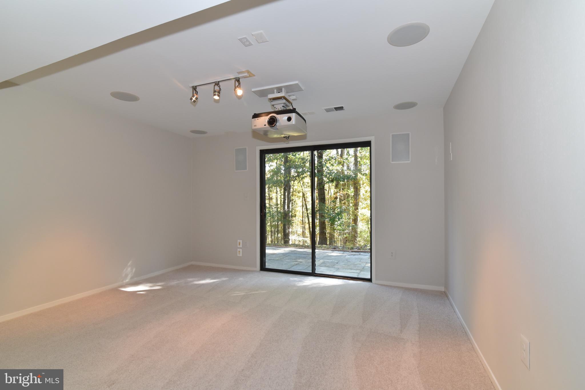 11117 Glade Drive Reston, VA 20191 - Photo 57 of 75 Recreation Room w/projection screen equipment.