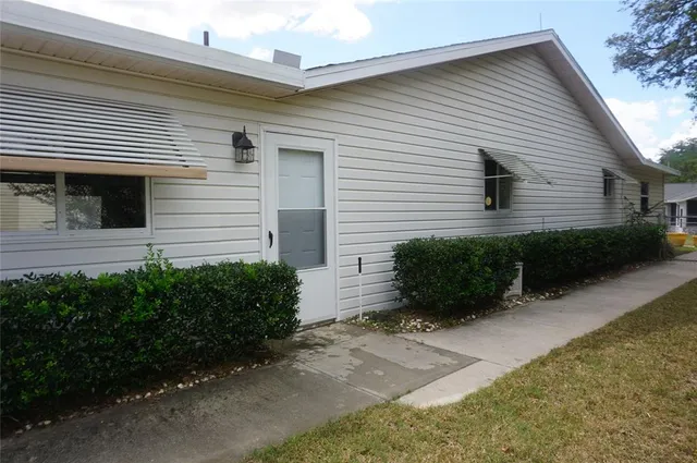 a view of a back yard of the house