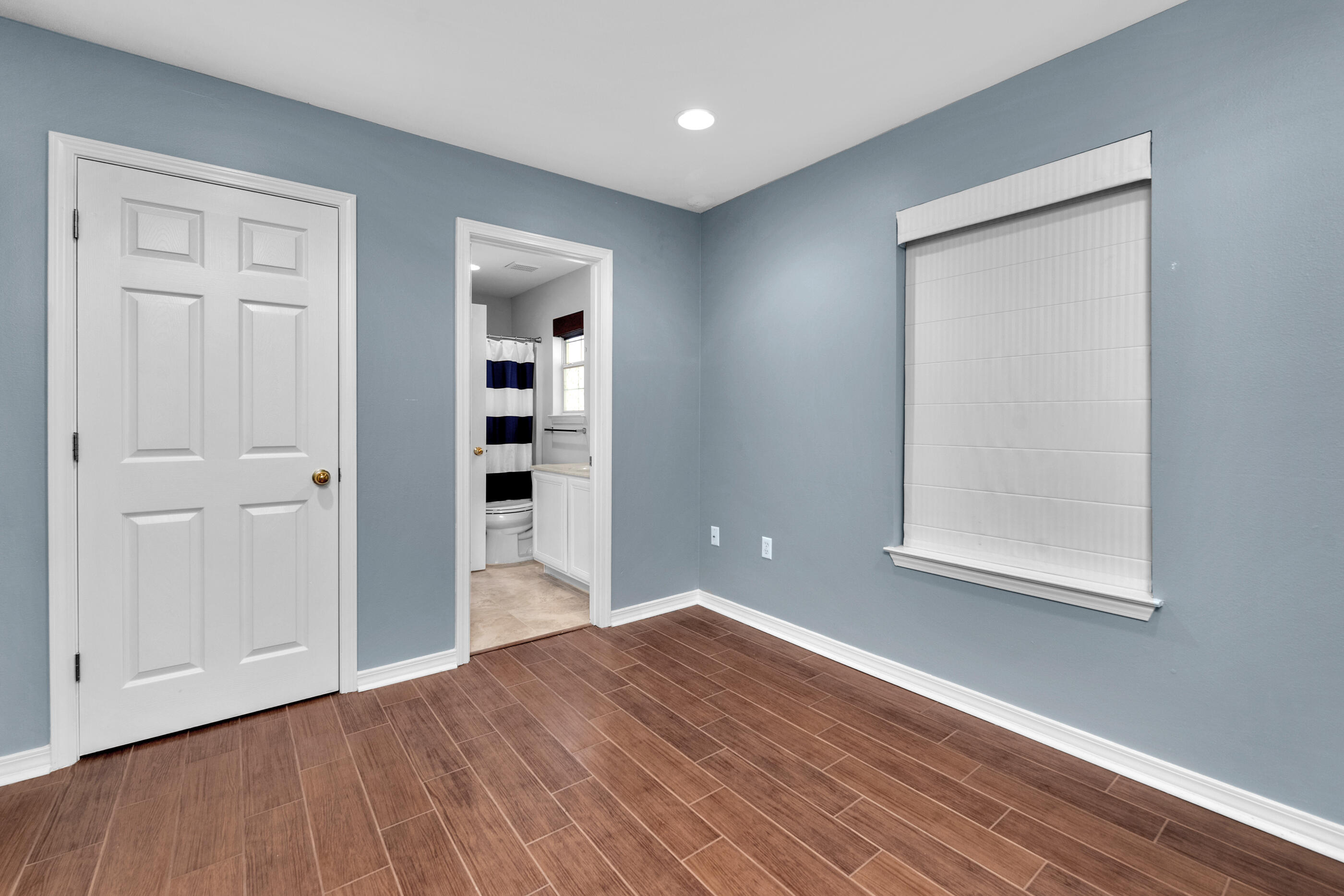 44 Beacon Way Santa Rosa Beach, FL 32459 - Photo 16 of 29 a view of an empty room with wooden floor and closet