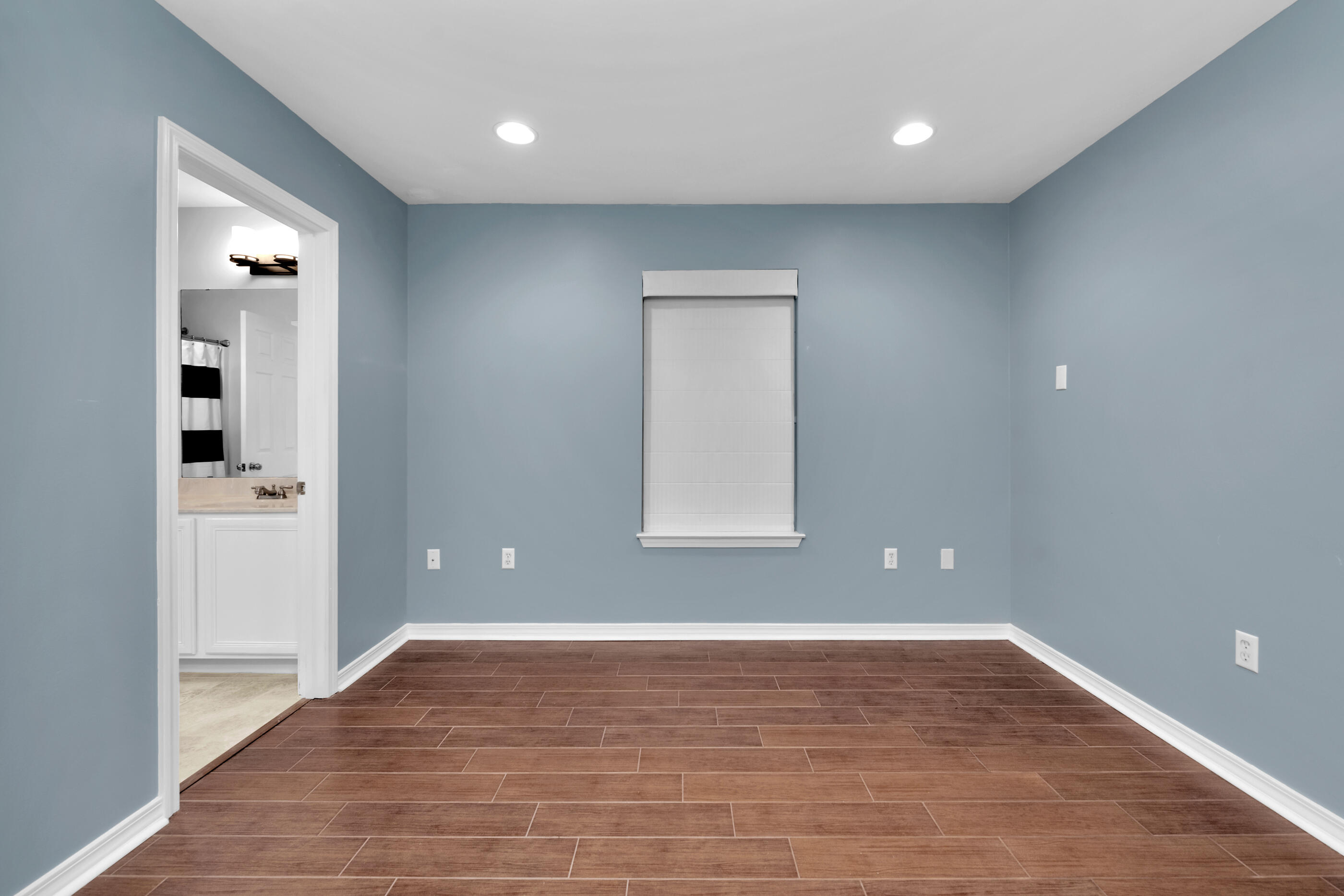 44 Beacon Way Santa Rosa Beach, FL 32459 - Photo 17 of 29 wooden floor in an empty room with a window