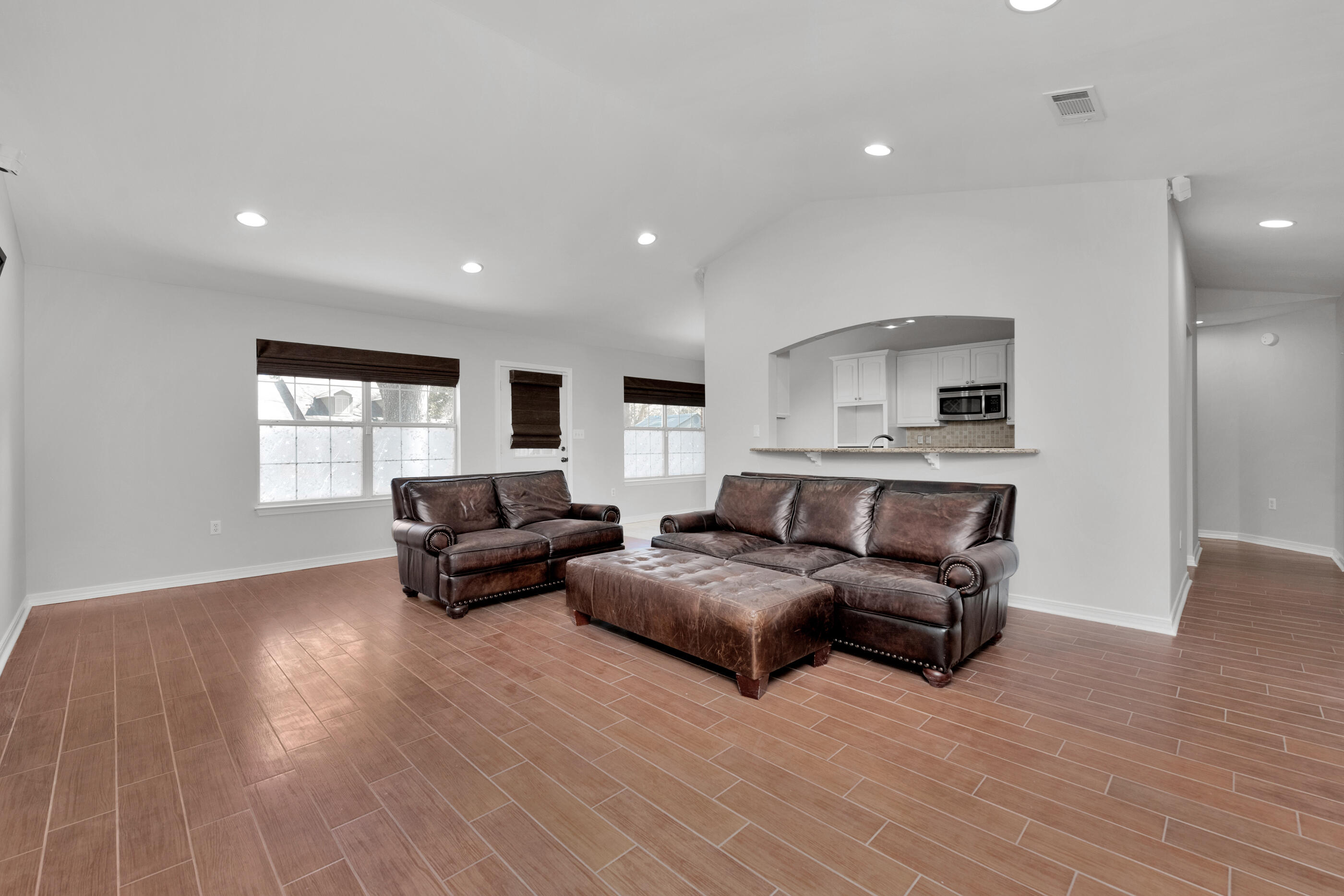 44 Beacon Way Santa Rosa Beach, FL 32459 - Photo 5 of 29 a living room with furniture and a wooden floor