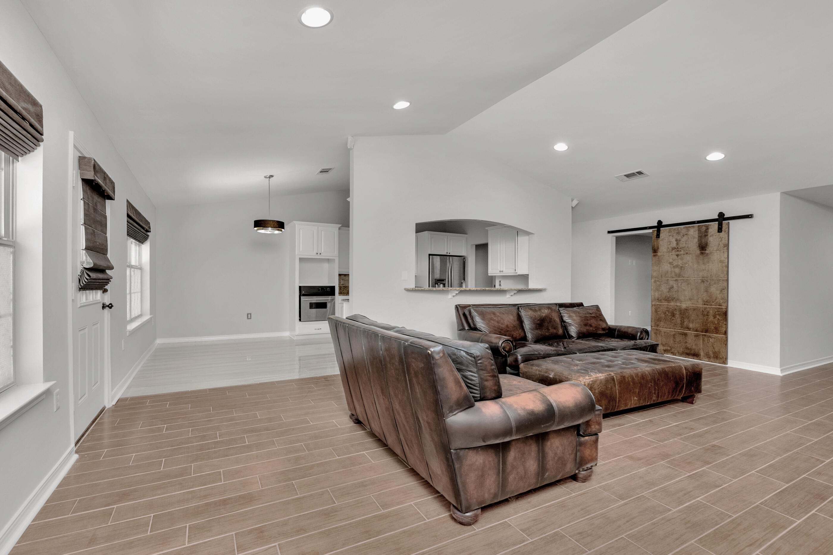 44 Beacon Way Santa Rosa Beach, FL 32459 - Photo 6 of 29 a living room with furniture and a wooden floor