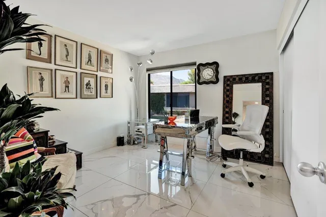 a view of a potted plant in front of a house