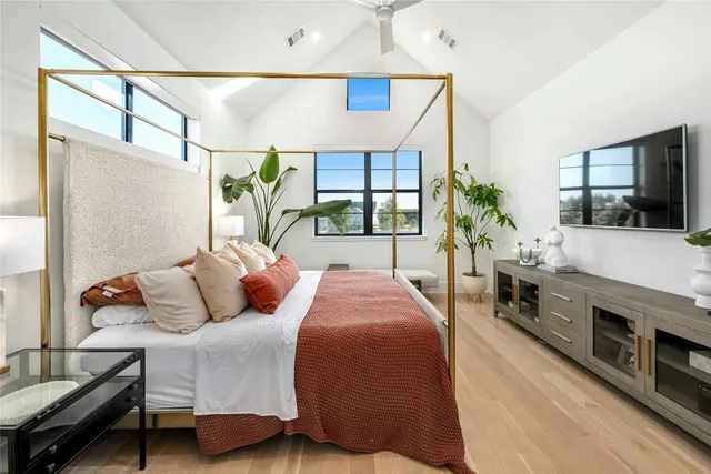 a bedroom with a bed and a closet