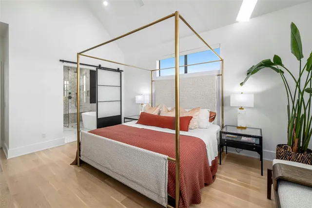 a bathroom with a tub and a sink