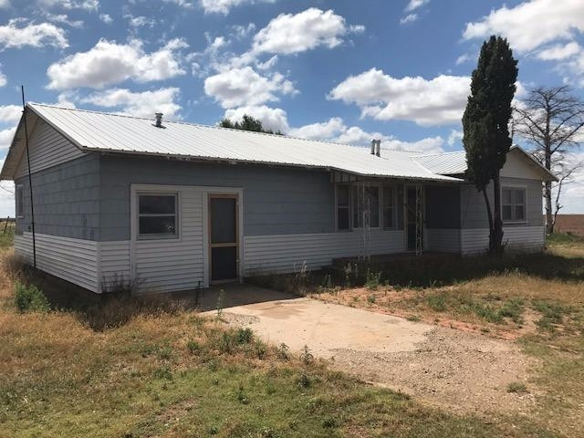 641 State Highway Ralls, TX 79357 - Photo 1 of 7 a view of a house with a yard