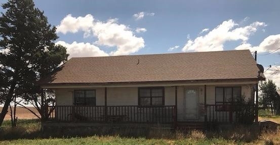 641 State Highway Ralls, TX 79357 - Photo 2 of 7 a backyard of a house with lots of green space
