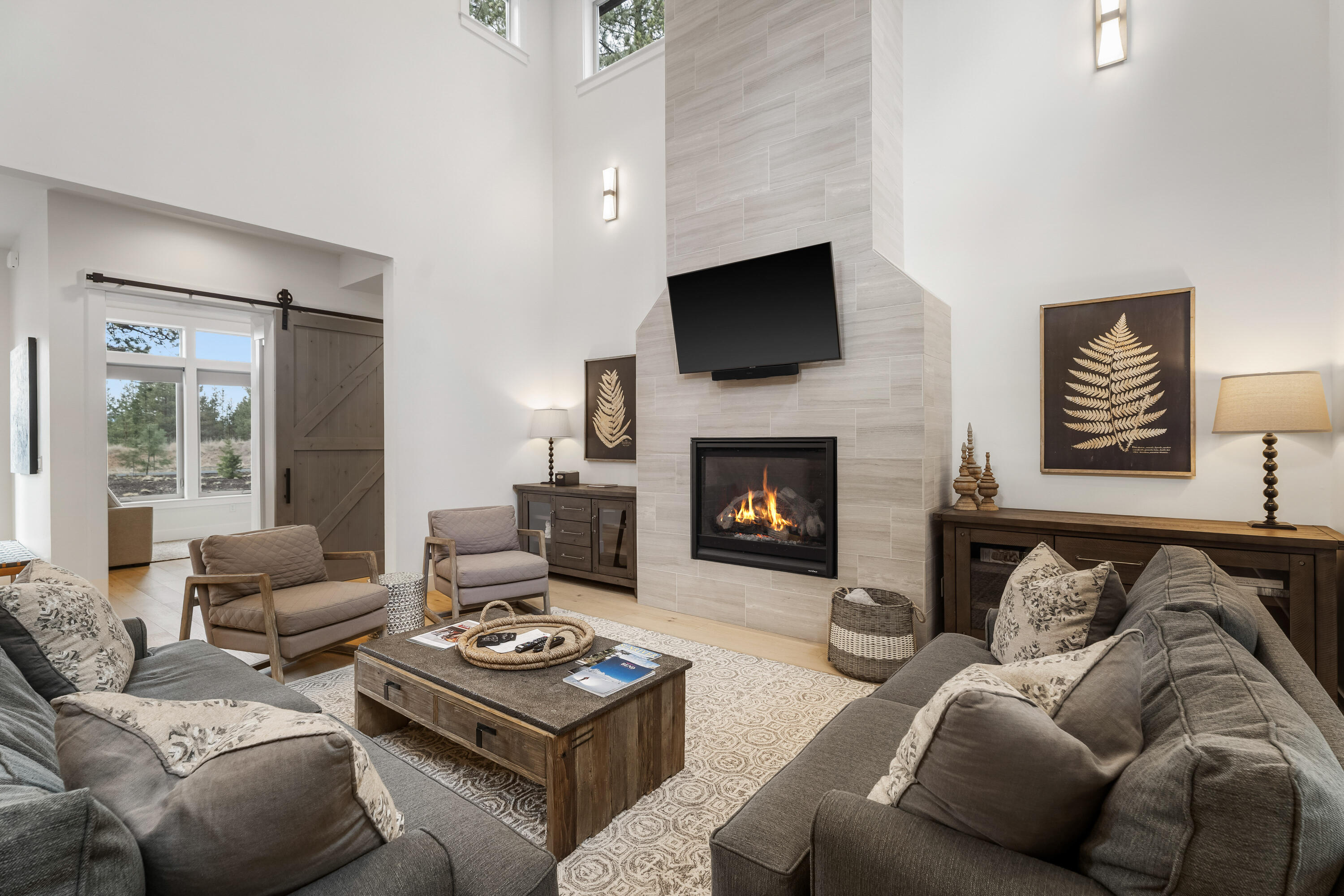 56302 Sable Rock Loop, Unit 255 Bend, OR 97707 - Photo 9 of 65 a living room with furniture and a fireplace