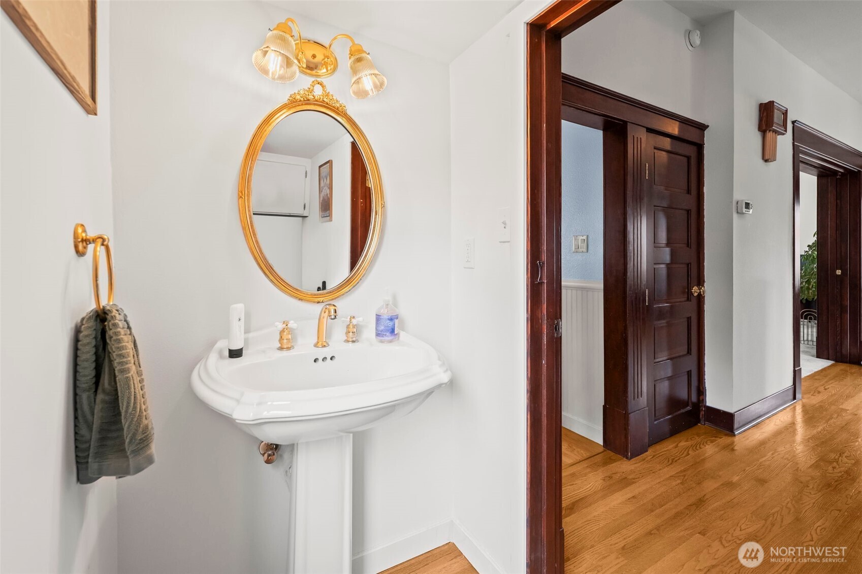 363 Del Monte Avenue Fircrest, WA 98466 - Photo 23 of 39 a bathroom with a sink and a mirror