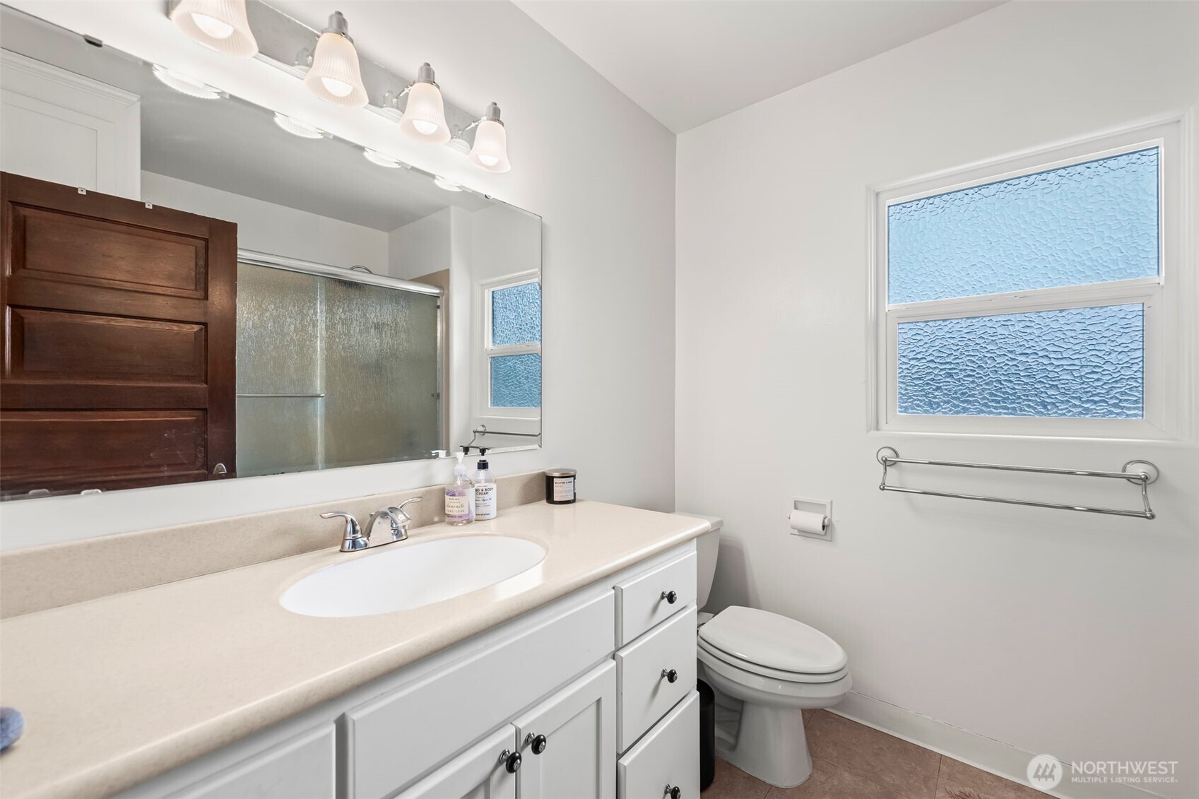 363 Del Monte Avenue Fircrest, WA 98466 - Photo 27 of 39 a bathroom with a sink toilet and shower