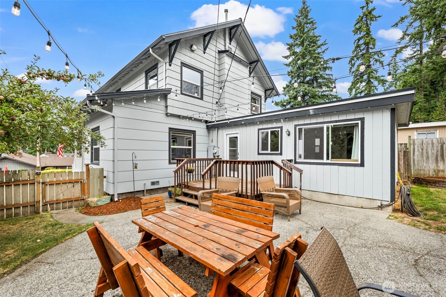 363 Del Monte Avenue Fircrest, WA 98466 - Photo 34 of 39 a view of a house with backyard and sitting area