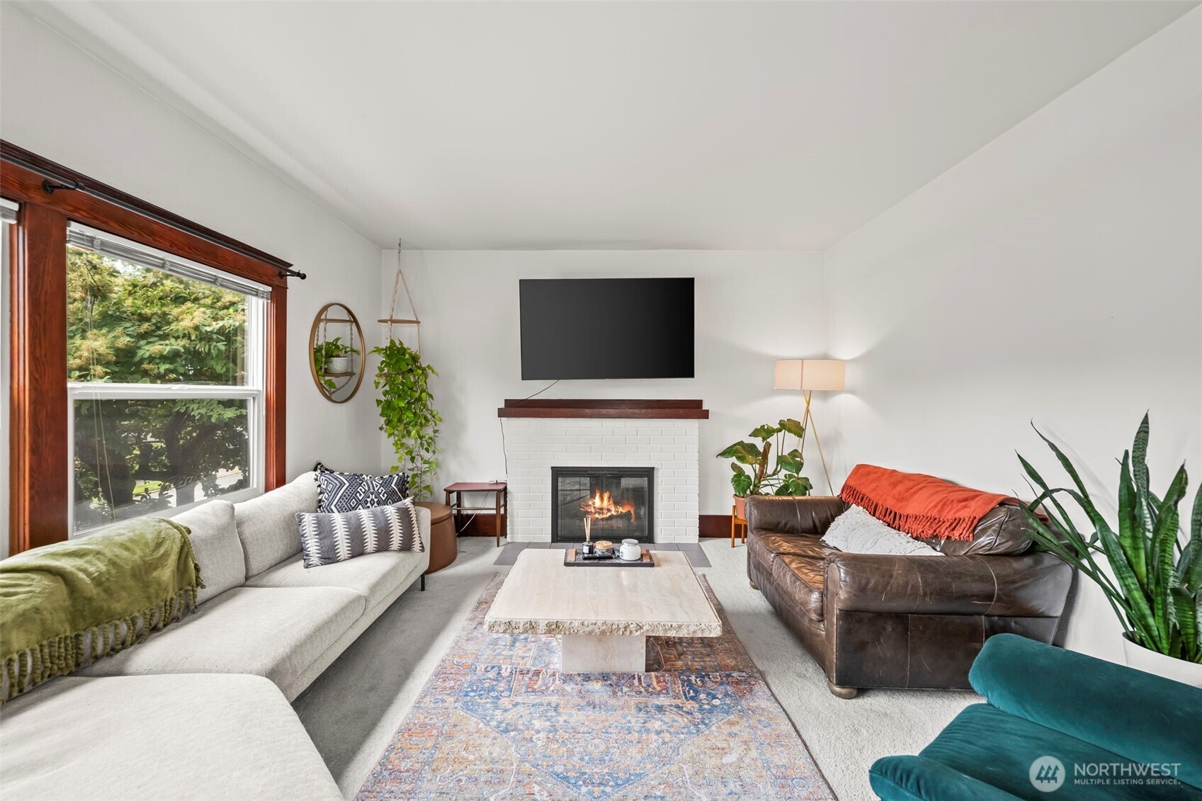 363 Del Monte Avenue Fircrest, WA 98466 - Photo 5 of 39 a living room with furniture a fireplace and a flat screen tv