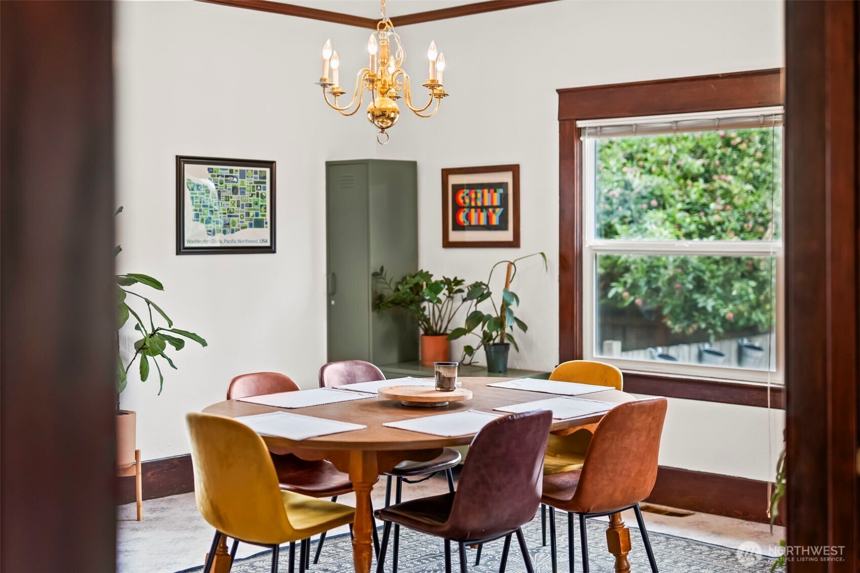 363 Del Monte Avenue Fircrest, WA 98466 - Photo 8 of 39 a dining room with furniture a large window and a potted plant