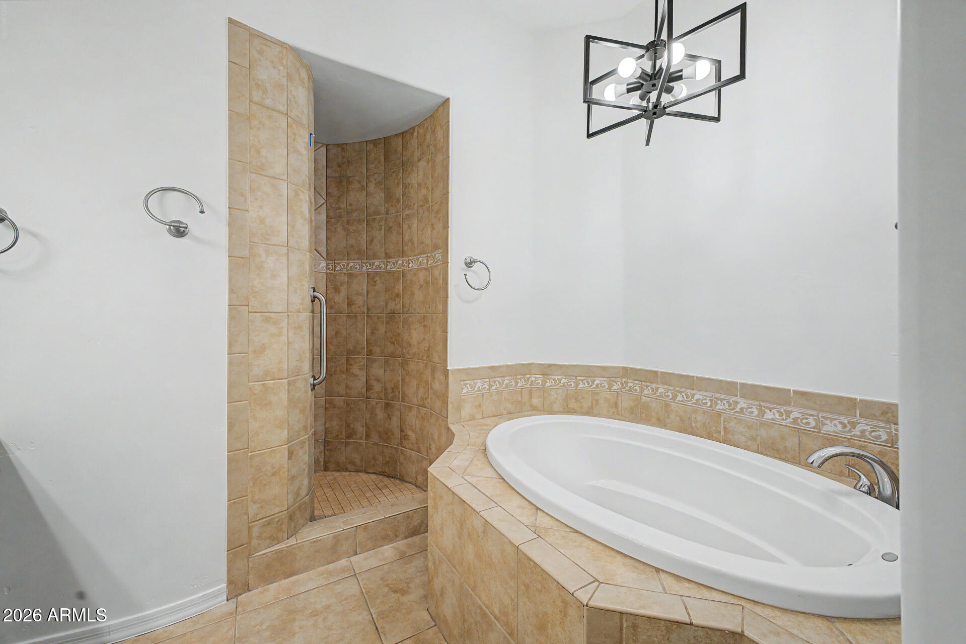 6202 East McKellips Road, Unit 19 Mesa, AZ 85215 - Photo 20 of 37 a bathroom with a tub a sink and a shower