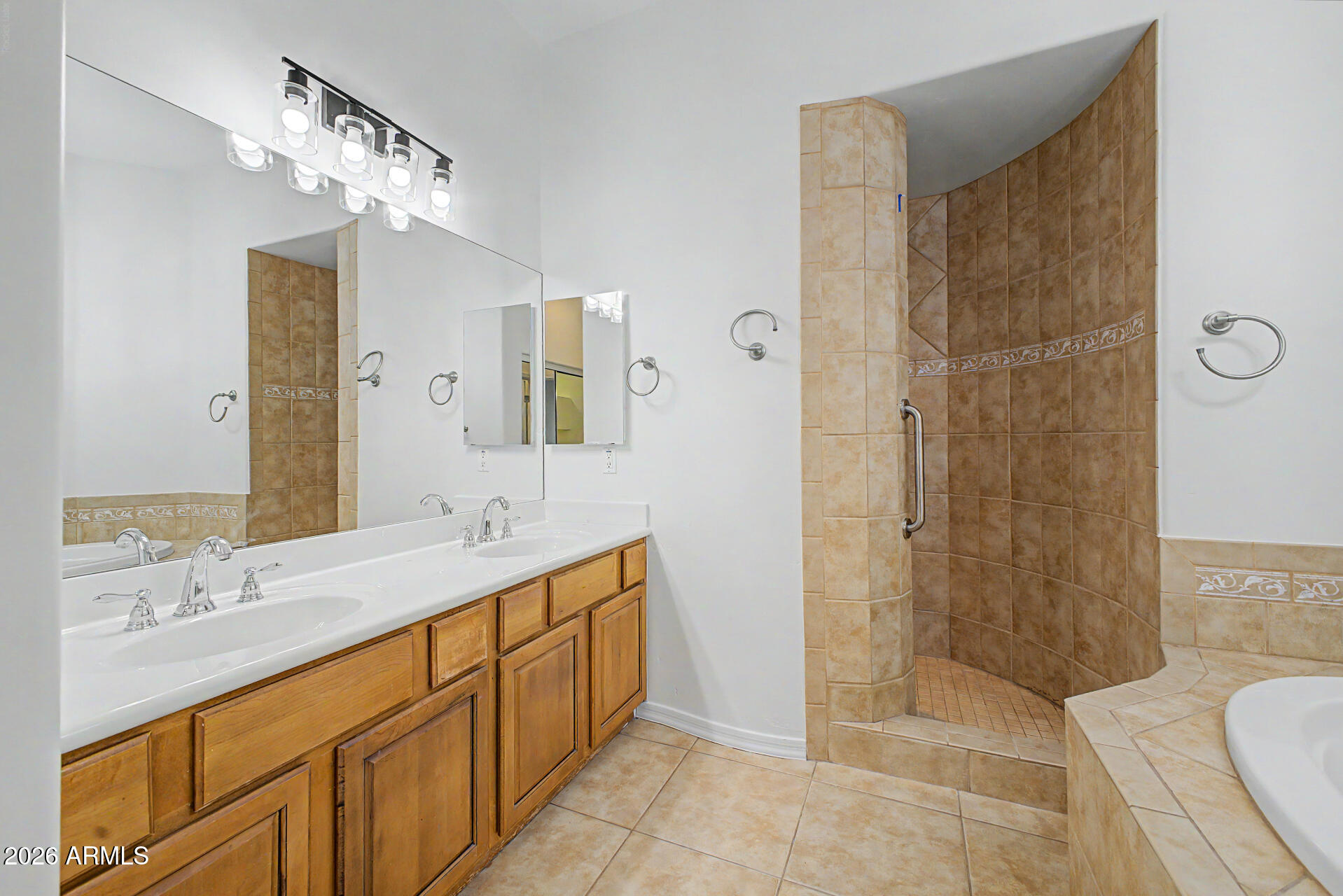 6202 East McKellips Road, Unit 19 Mesa, AZ 85215 - Photo 21 of 37 a bathroom with a sink a toilet and shower