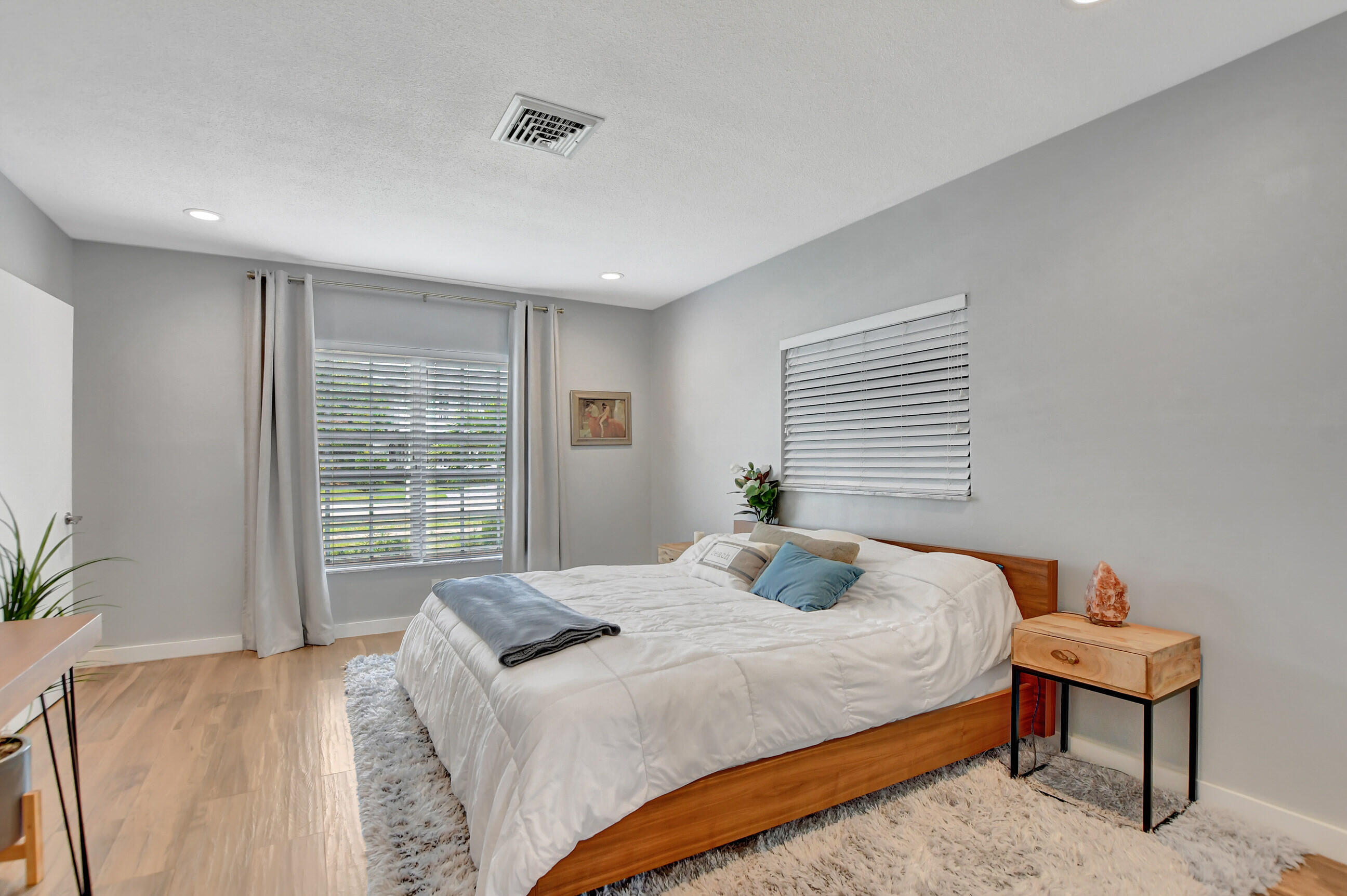 510 Silver Lane Boca Raton, FL 33432 - Photo 10 of 24 a bedroom with a bed and a window
