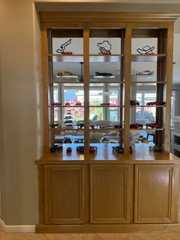 a room with furniture and a book shelf