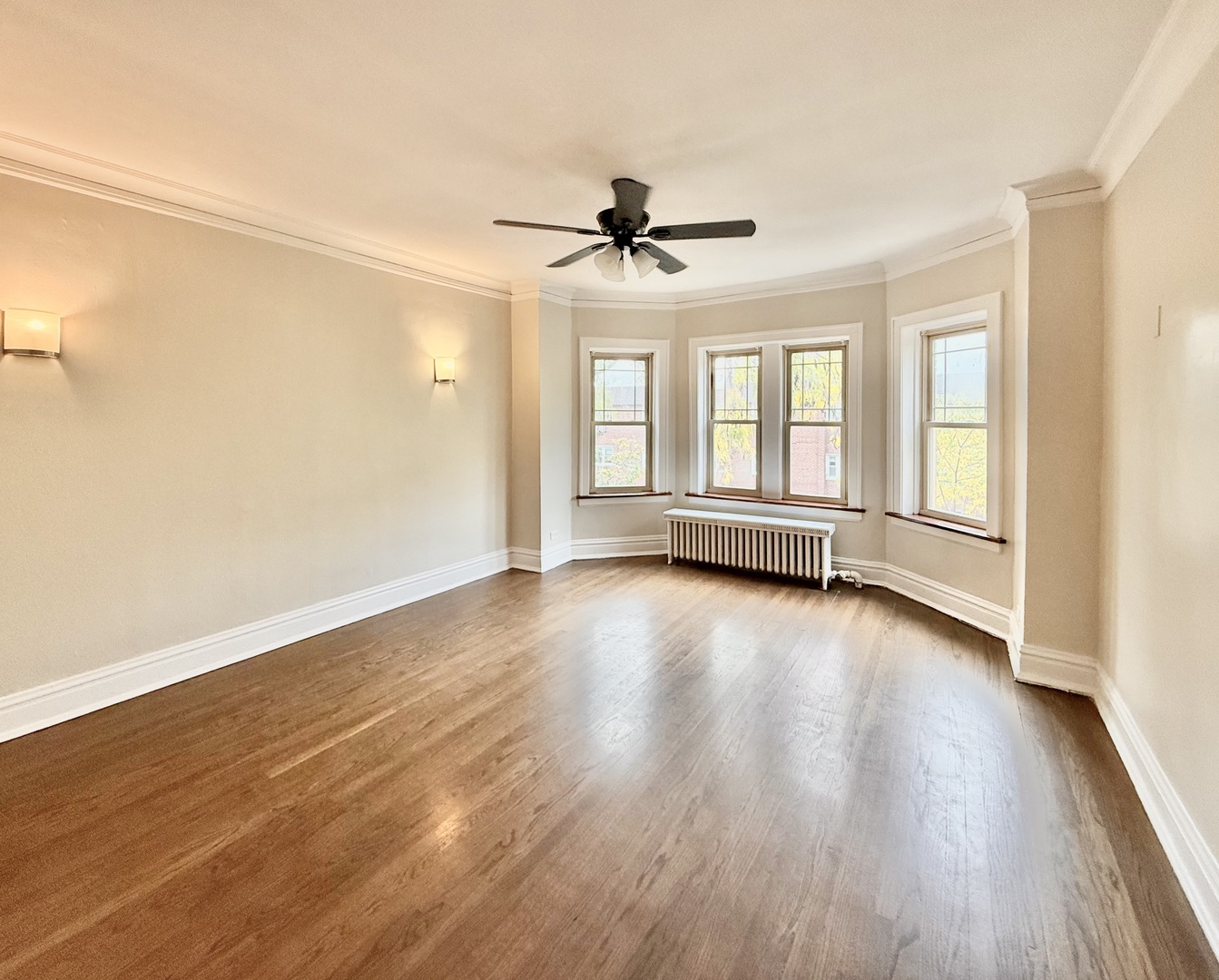 314 North Maple Avenue, Unit 3S Oak Park, IL 60302 - Photo 2 of 22 an empty room with wooden floor and windows
