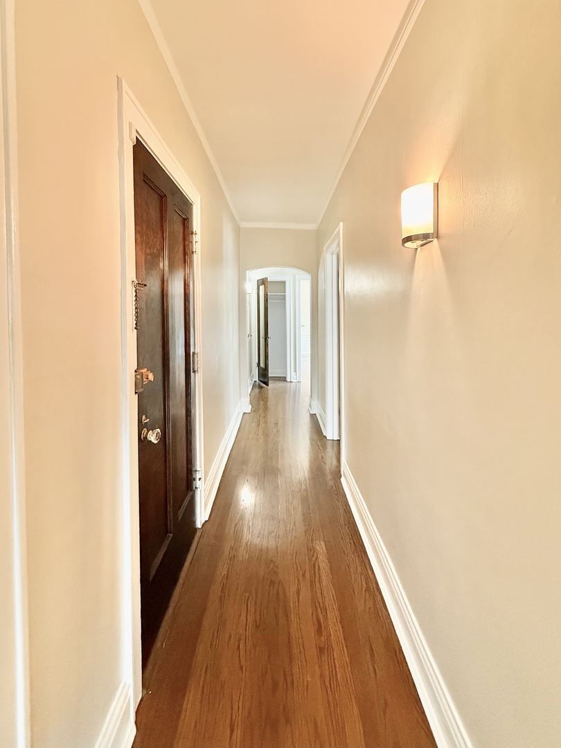314 North Maple Avenue, Unit 3S Oak Park, IL 60302 - Photo 7 of 22 a view of a hallway with wooden floor
