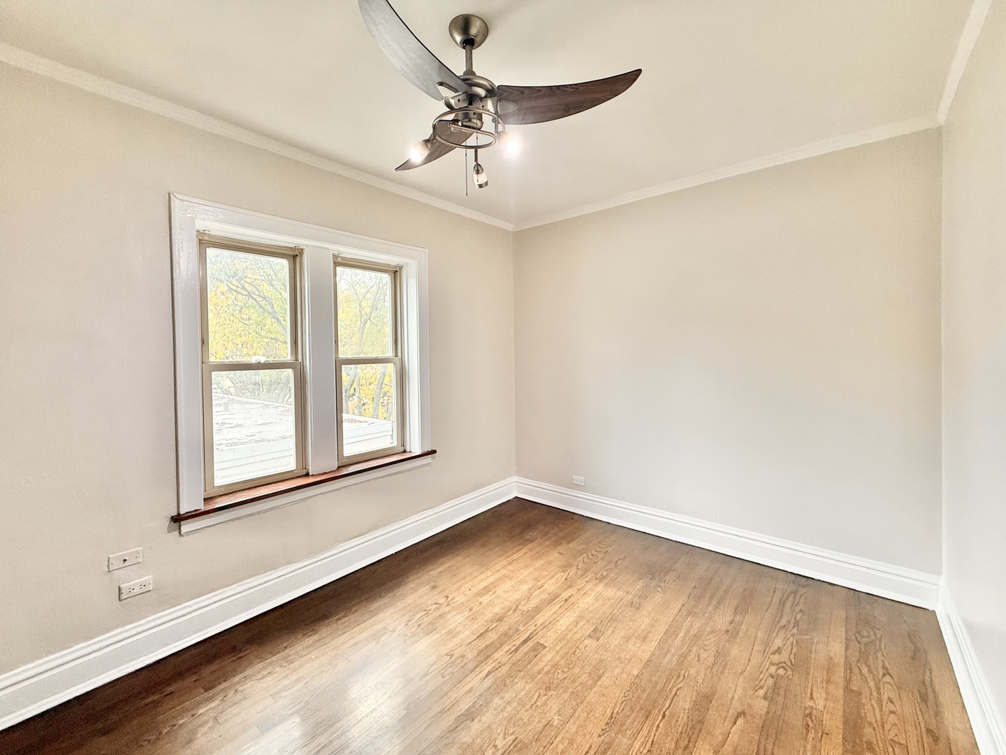 314 North Maple Avenue, Unit 3S Oak Park, IL 60302 - Photo 8 of 22 wooden floor in an empty room with a window