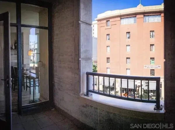 a view of a porch with a backyard