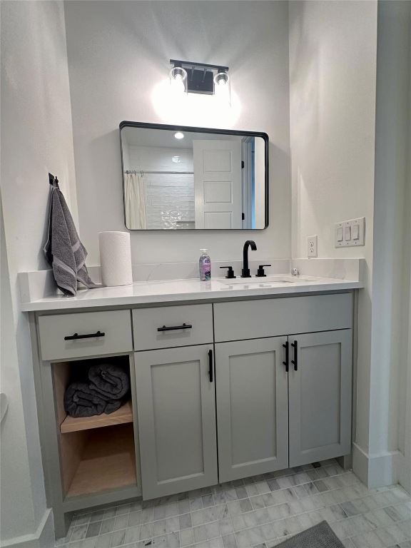 3417 Elija Street, Unit 2 Austin, TX 78745 - Photo 15 of 28 Bathroom with a shower with curtain and vanity