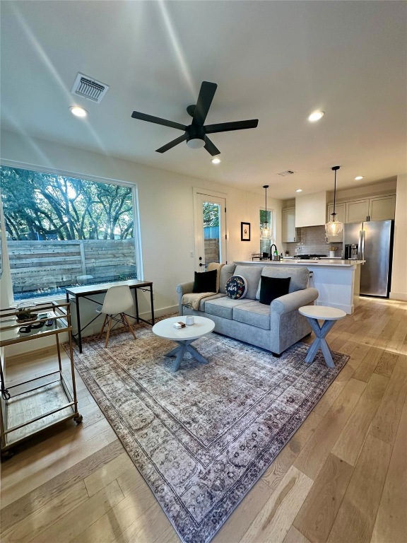 3417 Elija Street, Unit 2 Austin, TX 78745 - Photo 2 of 28 Living room featuring light wood-style floors, recessed lighting, and a ceiling fan