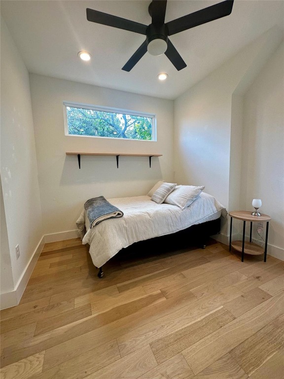 3417 Elija Street, Unit 2 Austin, TX 78745 - Photo 22 of 28 Bedroom featuring light wood-style floors, ceiling fan, and recessed lighting