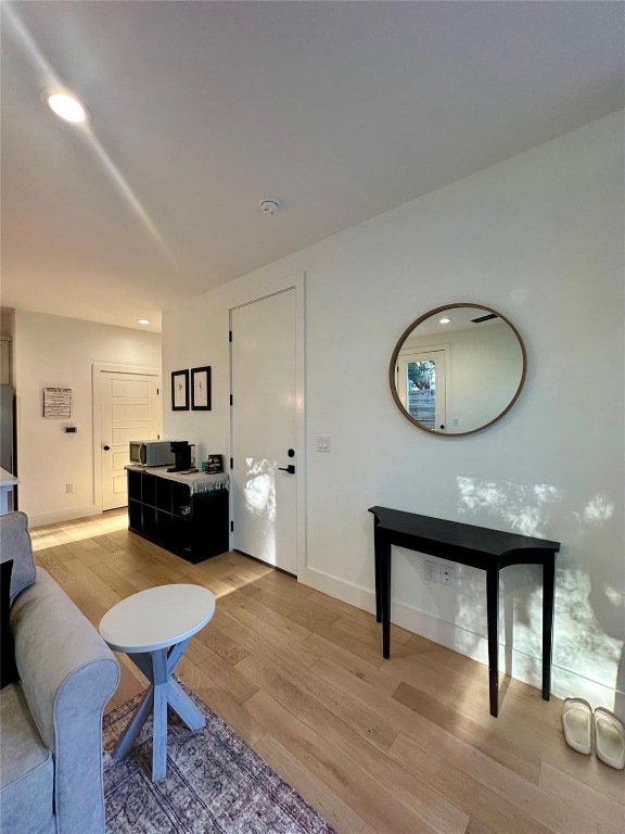 3417 Elija Street, Unit 2 Austin, TX 78745 - Photo 5 of 28 Living room featuring recessed lighting and light wood-type flooring